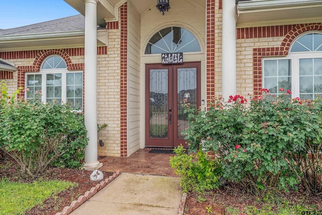3072 Yasmeen Cir, Flint, TX 75762 - entrance to property featuring brick siding, a shingled roof, and french doors