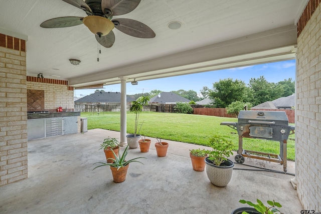 3072 Yasmeen Cir, Flint, TX 75762 - view of patio with an outdoor kitchen, grilling area, and a ceiling fan