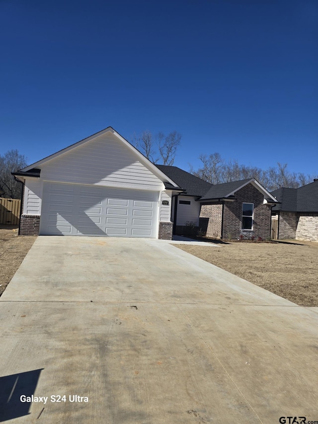 view of front of property featuring a garage