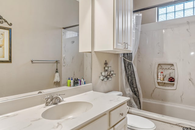 full bathroom with toilet, vanity, and shower / bathtub combination with curtain