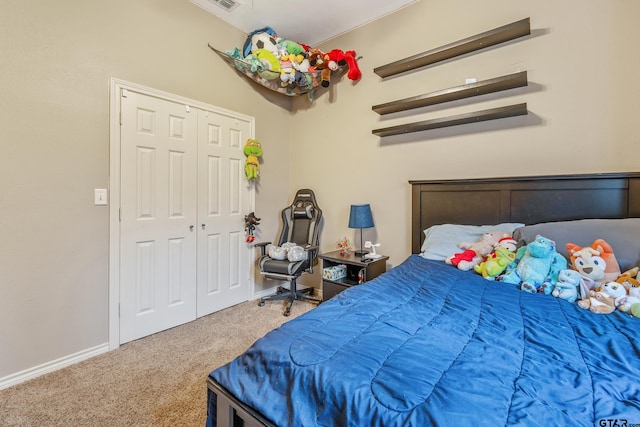 carpeted bedroom featuring a closet