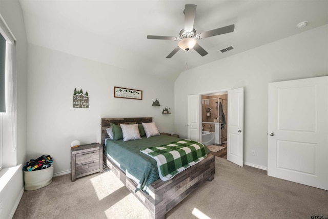 carpeted bedroom featuring connected bathroom and ceiling fan