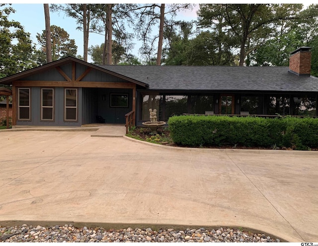 1638 E Tanglewood Dr, Hideaway, TX 75771 - view of front facade with a chimney