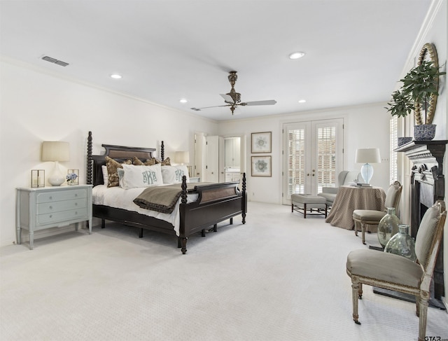 bedroom with ceiling fan, light carpet, access to exterior, and crown molding