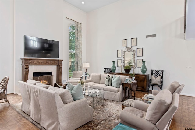 living room featuring parquet flooring