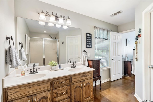 bathroom featuring walk in shower, vanity, and concrete floors