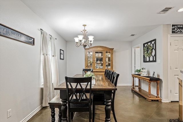 dining room with an inviting chandelier