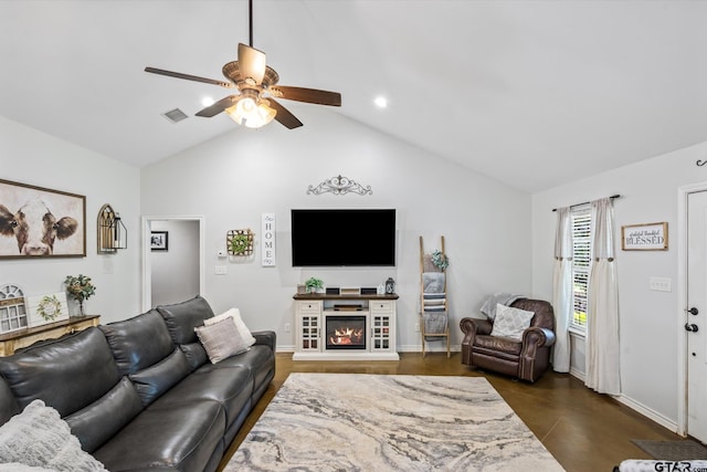 living room featuring vaulted ceiling and ceiling fan