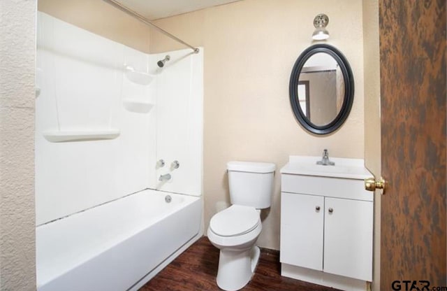 2709 Walton Rd, Tyler, TX 75701 - bathroom with vanity, wood finished floors, and shower / washtub combination