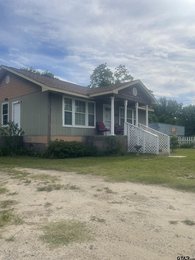 2709 Walton Rd, Tyler, TX 75701 - view of front of house with covered porch and driveway