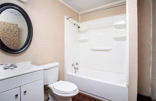 2709 Walton Rd, Tyler, TX 75701 - full bath with vanity, washtub / shower combination, wood finished floors, and crown molding