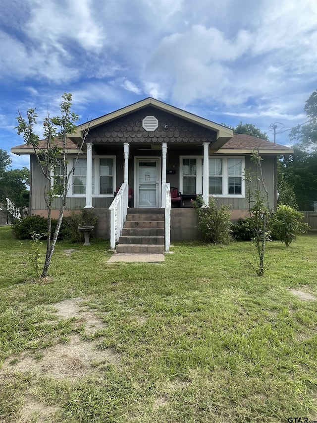 2709 Walton Rd, Tyler, TX 75701 - view of front of property with a porch and a front yard