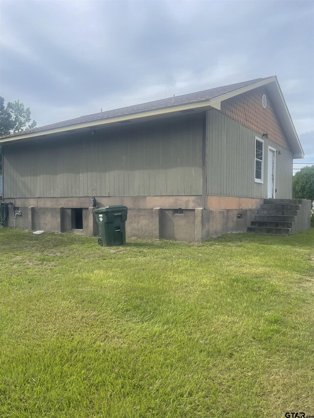 2709 Walton Rd, Tyler, TX 75701 - view of side of property with crawl space and a lawn