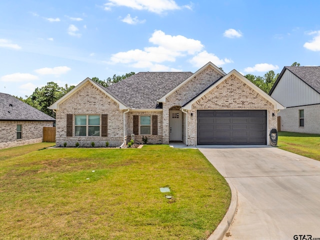 craftsman inspired home featuring a front yard and a garage