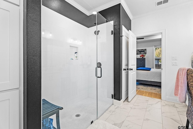 bathroom featuring wood-type flooring, an enclosed shower, and ornamental molding