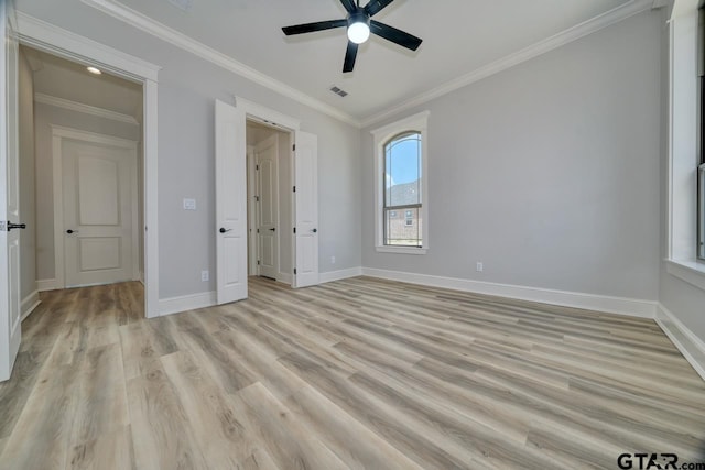 unfurnished bedroom featuring light wood-type flooring, a closet, ceiling fan, and crown molding