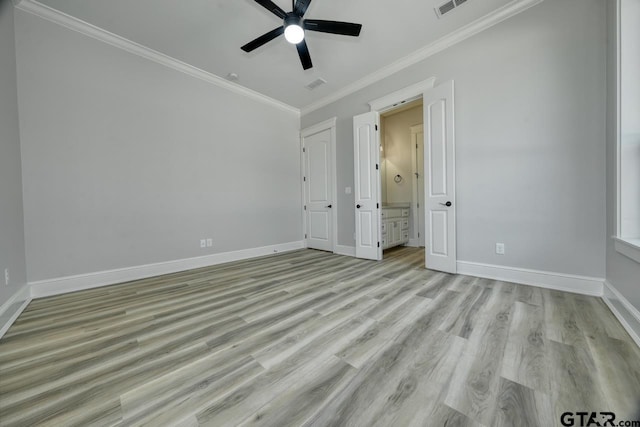 unfurnished bedroom with ceiling fan, ensuite bathroom, ornamental molding, and light wood-type flooring