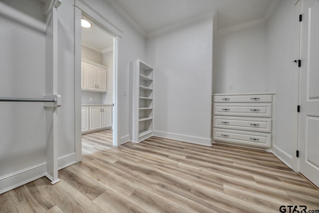 walk in closet featuring light hardwood / wood-style floors