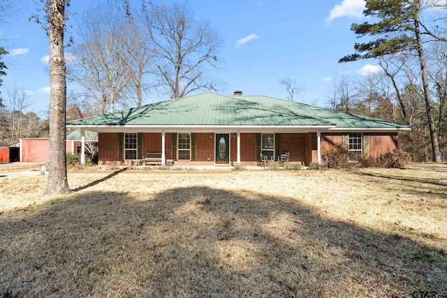 view of front of property with a front lawn and a porch