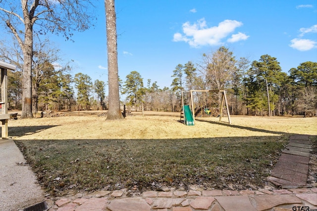 view of yard with a playground