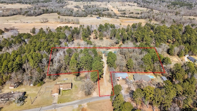 birds eye view of property featuring a rural view