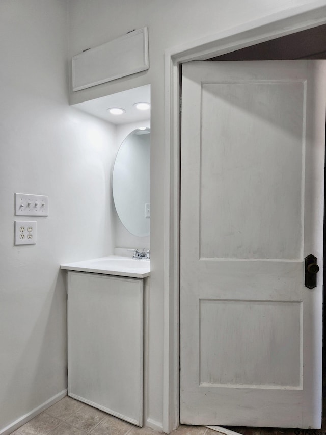501 E Park Ave, Palestine, TX 75801 - bathroom with vanity and baseboards