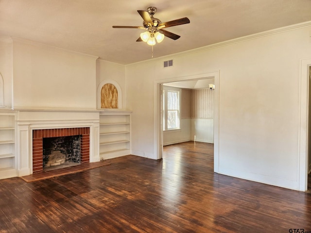 501 E Park Ave, Palestine, TX 75801 - unfurnished living room with a ceiling fan, wood finished floors, crown molding, a brick fireplace, and baseboards