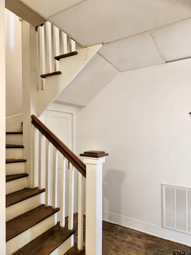 501 E Park Ave, Palestine, TX 75801 - stairway featuring wood finished floors and baseboards