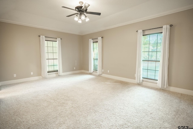 409 Rosebrook Cir, Whitehouse, TX 75791 - unfurnished room with a ceiling fan, plenty of natural light, light colored carpet, and crown molding