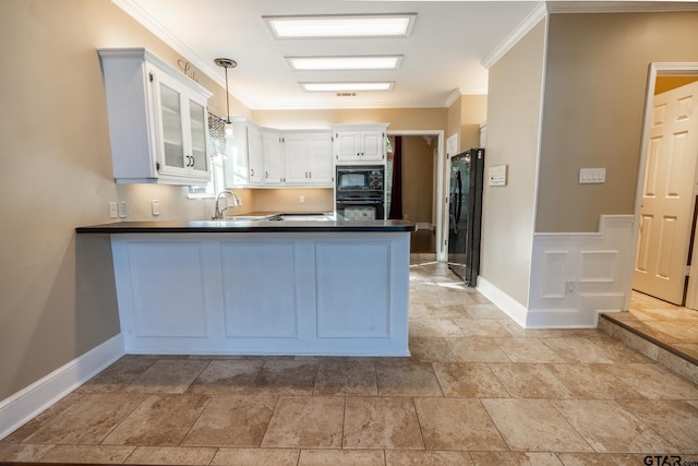 kitchen featuring white cabinetry, hanging light fixtures, kitchen peninsula, crown molding, and black appliances