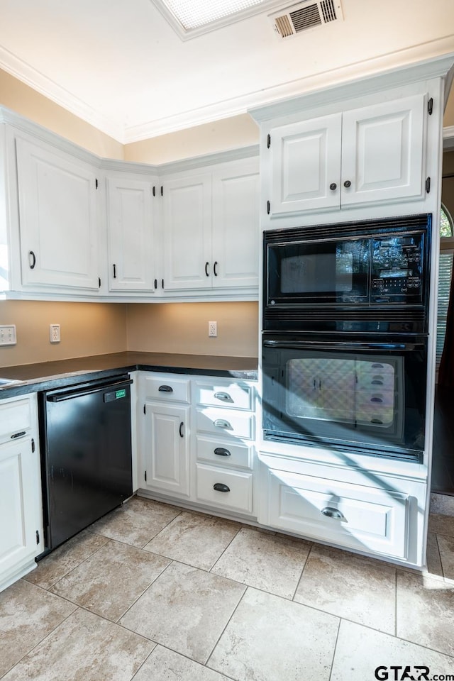 kitchen with white cabinetry, ornamental molding, and black appliances