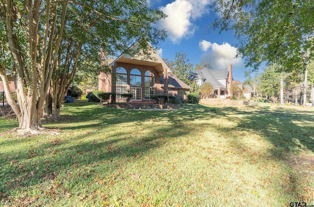 409 Rosebrook Cir, Whitehouse, TX 75791 - view of grassy yard with french doors