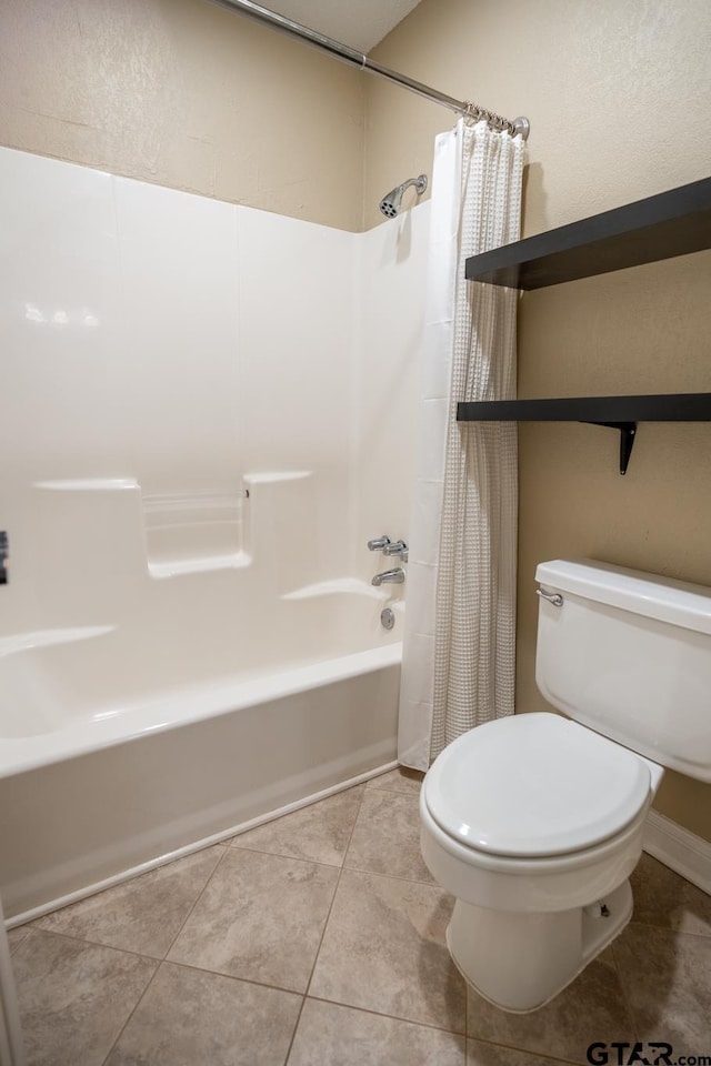 bathroom featuring tile patterned floors, toilet, and shower / bathtub combination with curtain