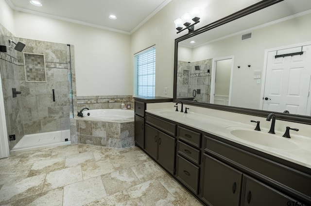 bathroom with plus walk in shower, vanity, and crown molding