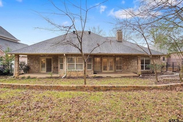 back of property featuring a patio area