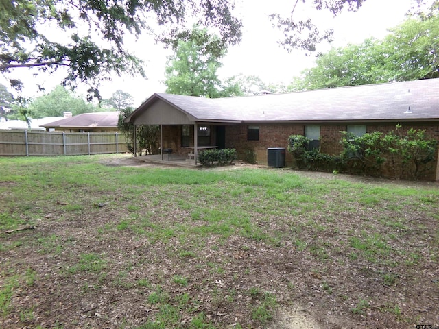 803 Corey, Whitehouse, TX 75791 - rear view of property with a patio and central AC