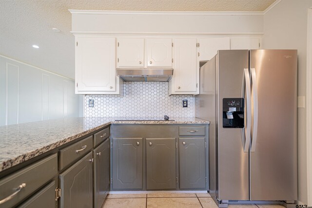 kitchen featuring gray cabinets, stainless steel fridge with ice dispenser, white cabinetry, and light tile patterned floors