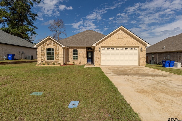 single story home with a garage, central air condition unit, and a front lawn