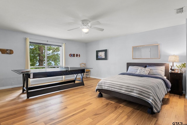 21028 Bay Shore Dr, Flint, TX 75762 - bedroom with light wood-style floors and a ceiling fan