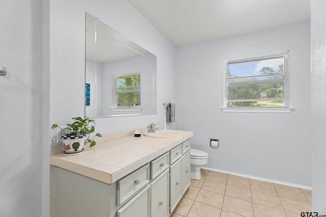 21028 Bay Shore Dr, Flint, TX 75762 - bathroom with healthy amount of natural light, vanity, and tile patterned floors