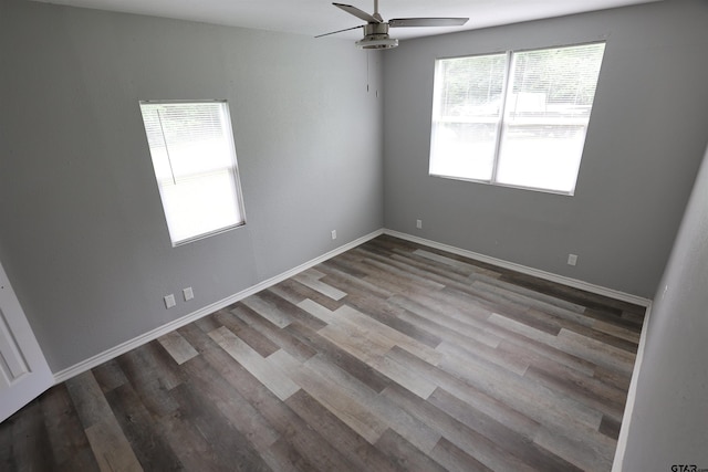 199 Linda Dr, Jefferson, TX 75657 - unfurnished room featuring plenty of natural light, a ceiling fan, wood finished floors, and baseboards