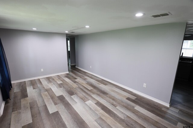 199 Linda Dr, Jefferson, TX 75657 - spare room with recessed lighting, wood finished floors, and baseboards