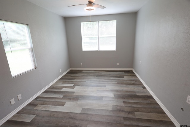 199 Linda Dr, Jefferson, TX 75657 - spare room featuring a ceiling fan, wood finished floors, and baseboards