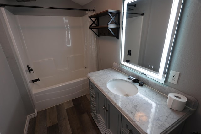 199 Linda Dr, Jefferson, TX 75657 - full bath featuring wood finished floors, vanity, and bathing tub / shower combination