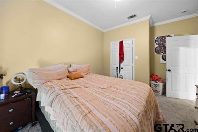 bedroom featuring carpet floors and ornamental molding