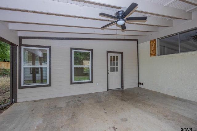 view of patio featuring ceiling fan