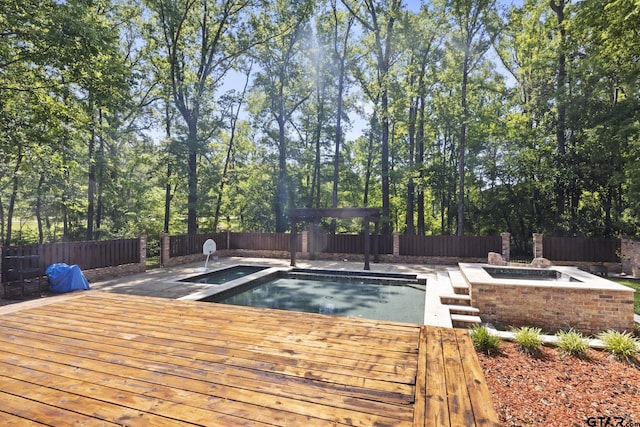 view of pool with a wooden deck