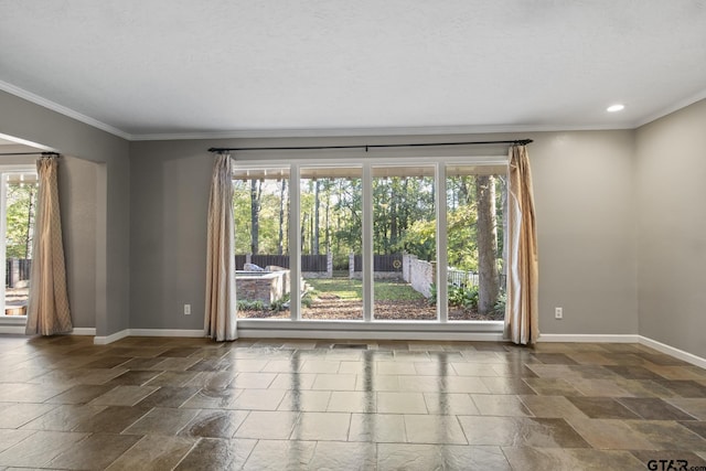 unfurnished room featuring ornamental molding