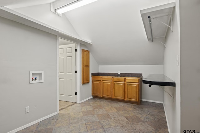 washroom with cabinets and washer hookup