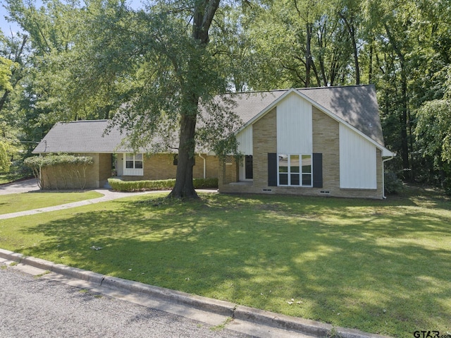 view of front of home with a front yard